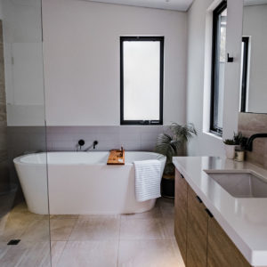 Villa bathroom with bath vanity and shower