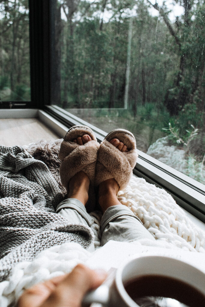 Cozy winter slippers with a morning coffee
